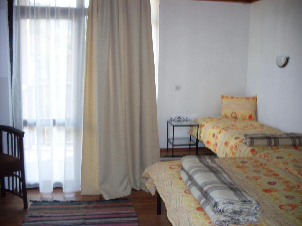 ホテル Tsutsovi House カロファー 部屋 写真